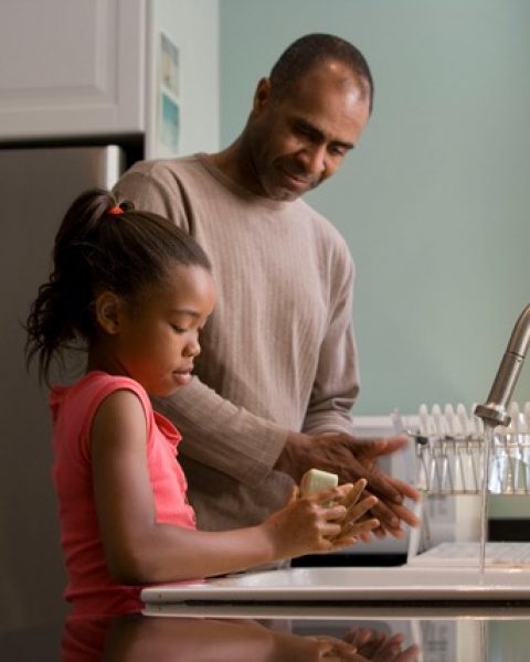 45 — Father and daughter at sink 45 -- Father and daughter at sink